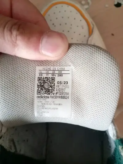 Zapatillas blancas con detalles verdes - miniatura 2