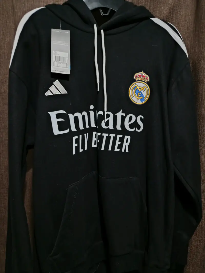 Polerón negro Real Madrid Y Cartera Nike