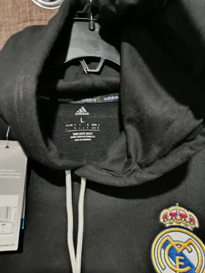 Polerón negro Real Madrid Y Cartera Nike - miniatura 3