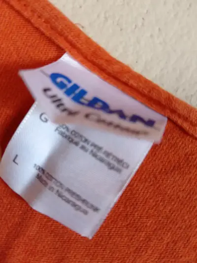 Polera naranja con estampado - miniatura 2