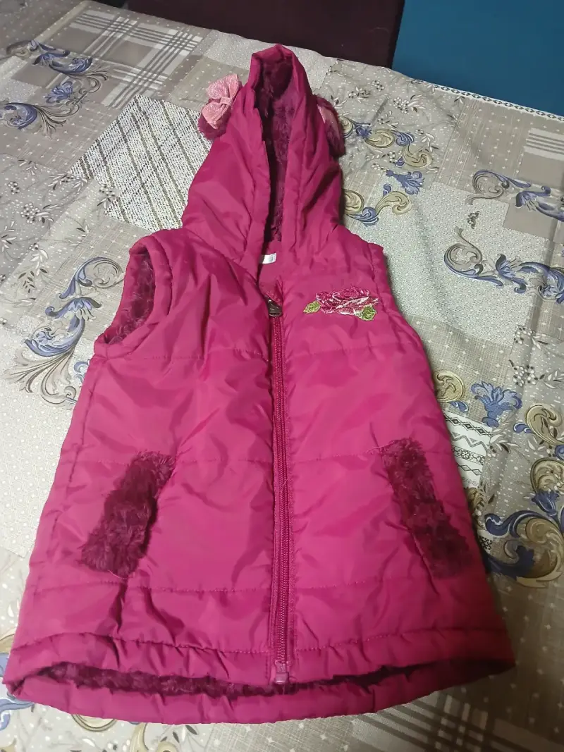 Parka sin mangas rosa para niña