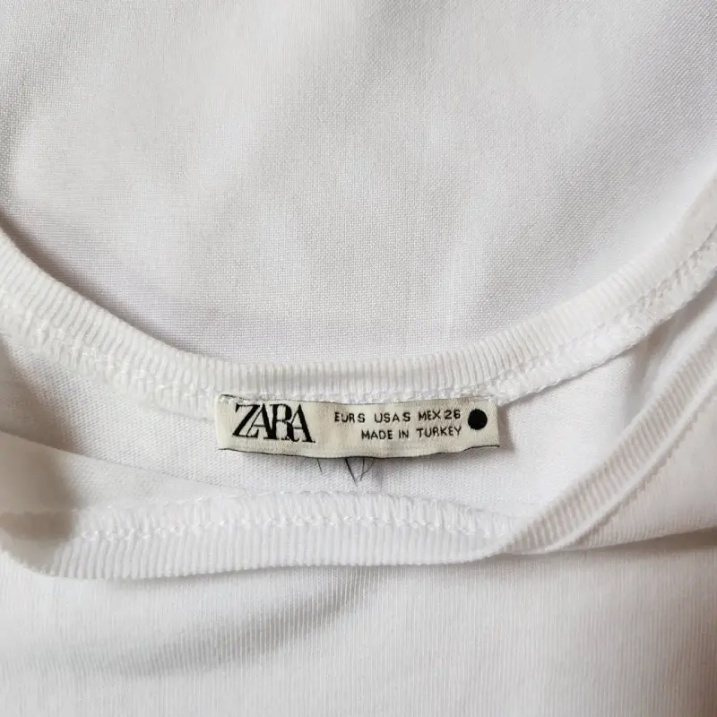 Top blanco con flecos - 3