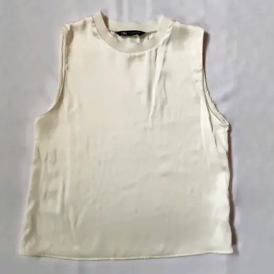 Blusa sin mangas beige - miniatura 1