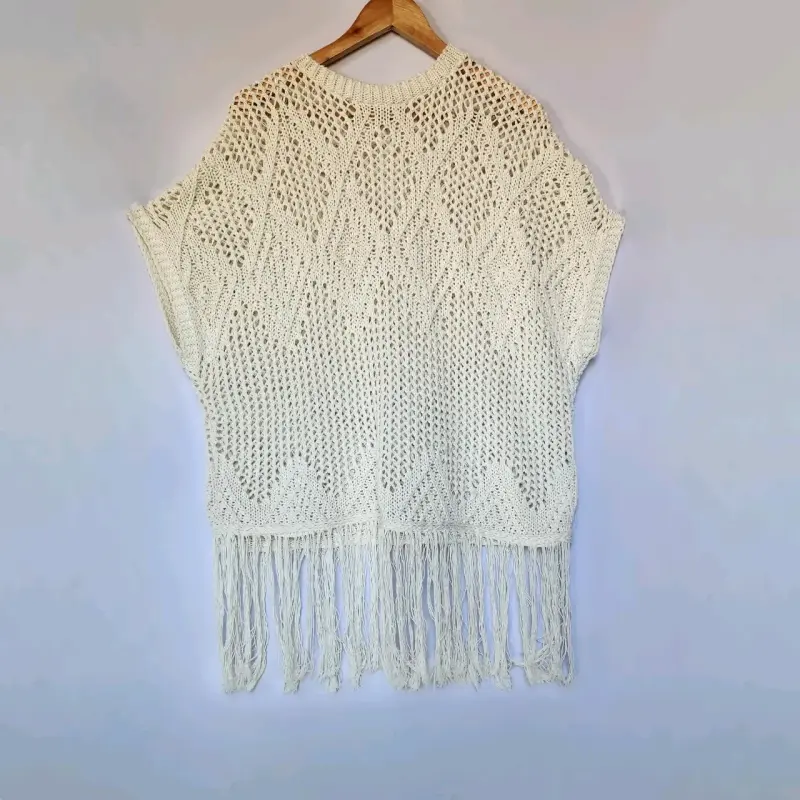 Chaleco tejido beige con flecos Zara(retorno)