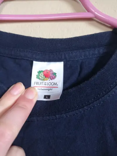 Polera azul con logo - miniatura 3