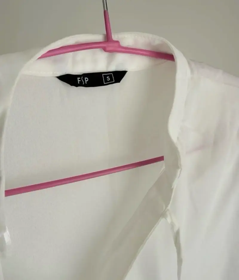 Blusa blanca sin mangas - 2