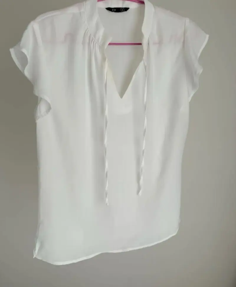 Blusa blanca sin mangas - 3