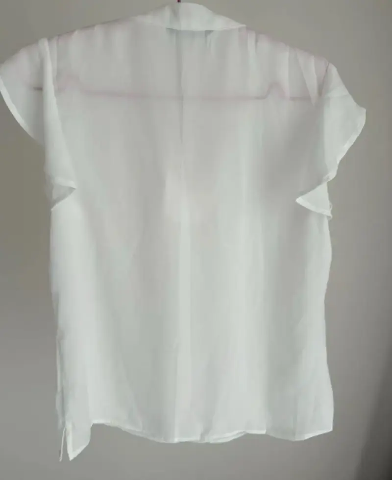 Blusa blanca sin mangas - 4