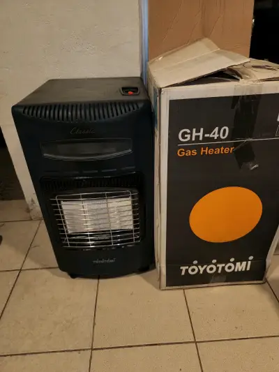 Calefactor a gas toyotomi híbrido 10 kilos - miniatura 1
