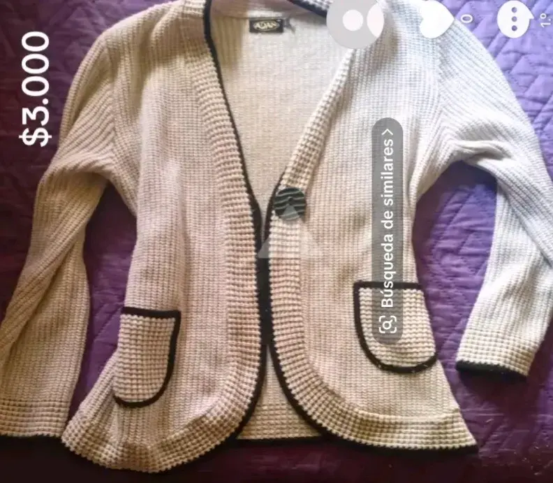 Cardigan beige con borde negro