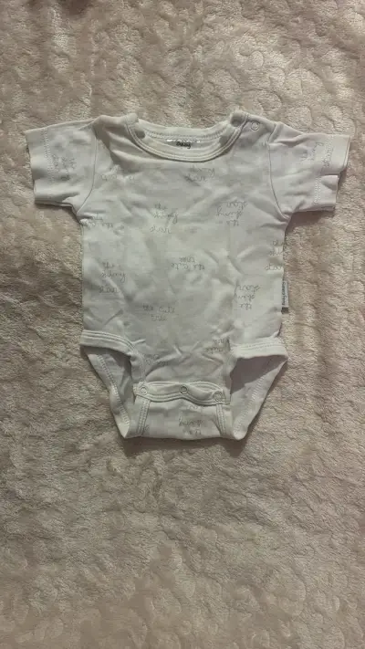 Body bebé blanco con estampados - miniatura 1