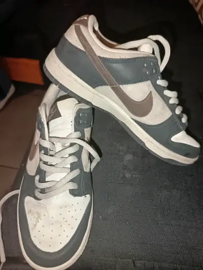 Zapatillas Nike gris y blanco - miniatura 1