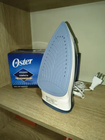 Plancha Oster compacta nueva - miniatura 2