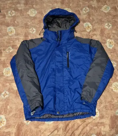 Chaqueta impermeable azul y gris - miniatura 1