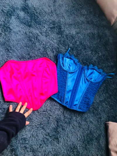 Corsets fucsia y azul en buena condición - miniatura 1