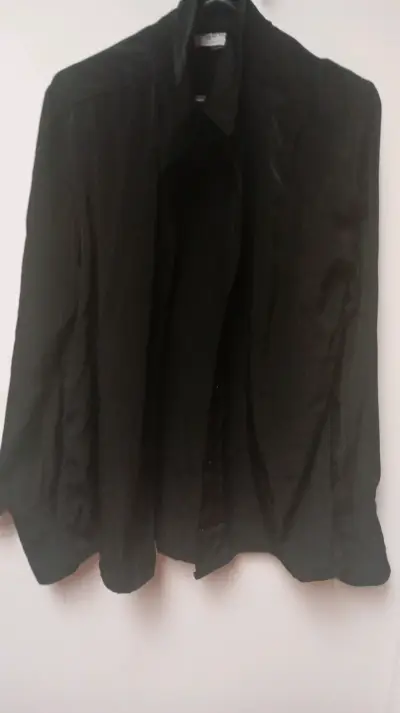 Chaqueta negra elegante - miniatura 1