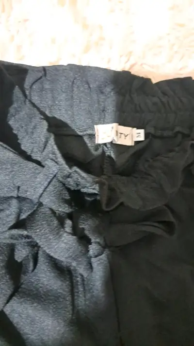 Pantalones negros con lazo - miniatura 2