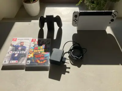 Nintendo Switch OLED con juegos - miniatura 1
