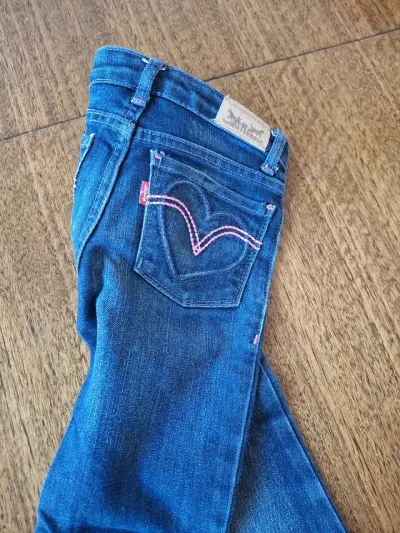 Jeans azules con detalle rosa - miniatura 2