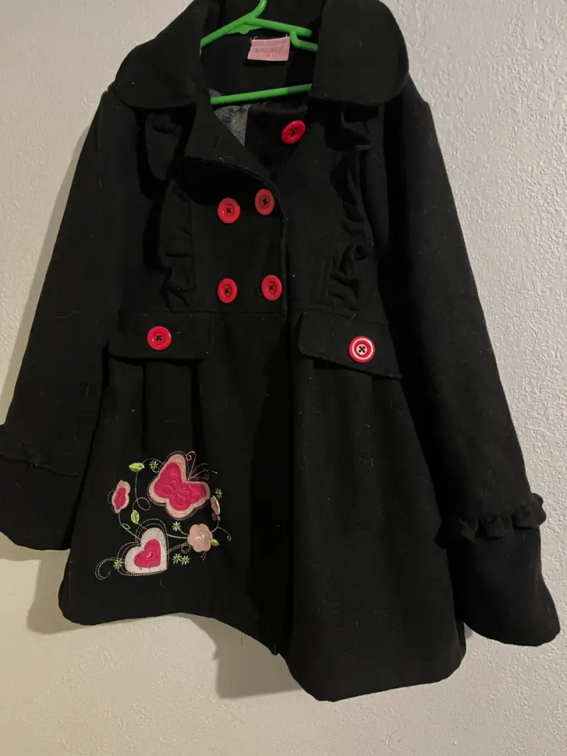 Abrigo infantil negro bordado talla 10
