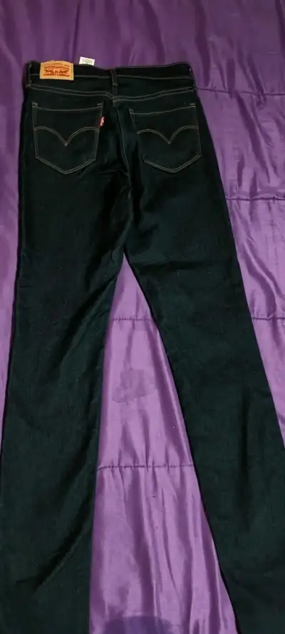Jeans oscuros de hombre - miniatura 1