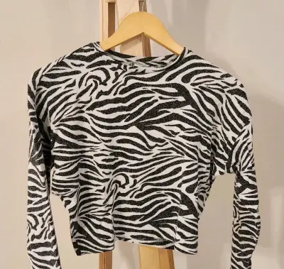 Chaleco H&M talla XS animal print - miniatura 1