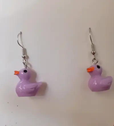Aros patito morados y amarillos - miniatura 1