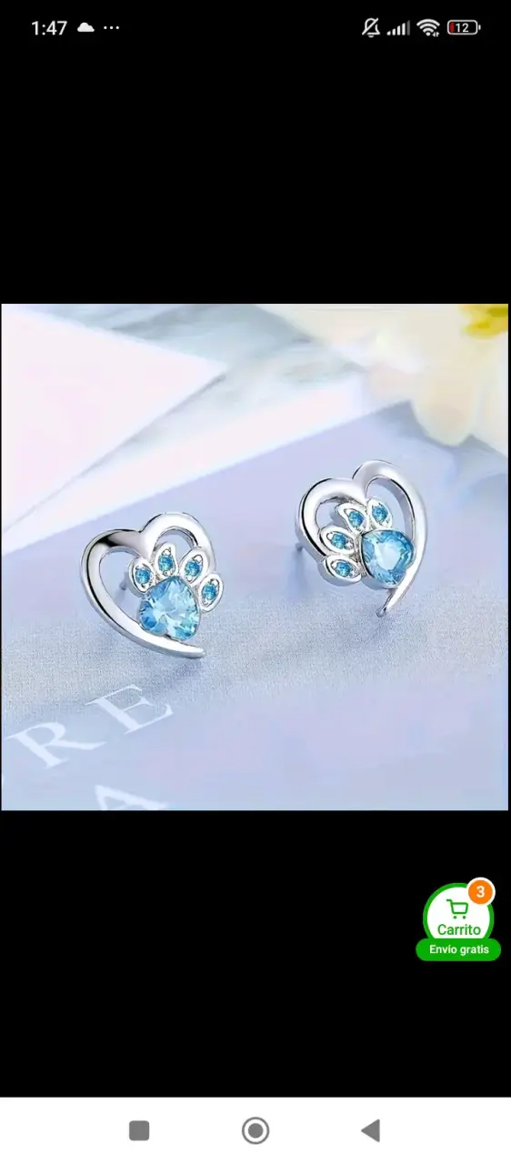 Aros plateados con gemas azules