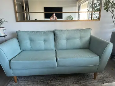 Sofá azul celeste moderno - miniatura 1