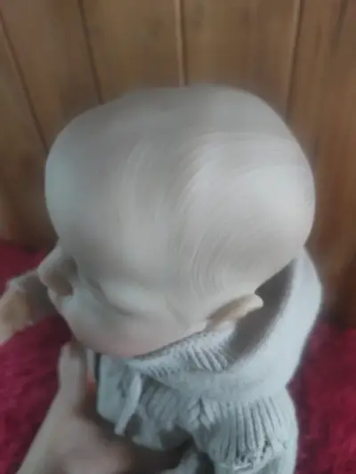 Muñeca reborn con accesorios - miniatura 3