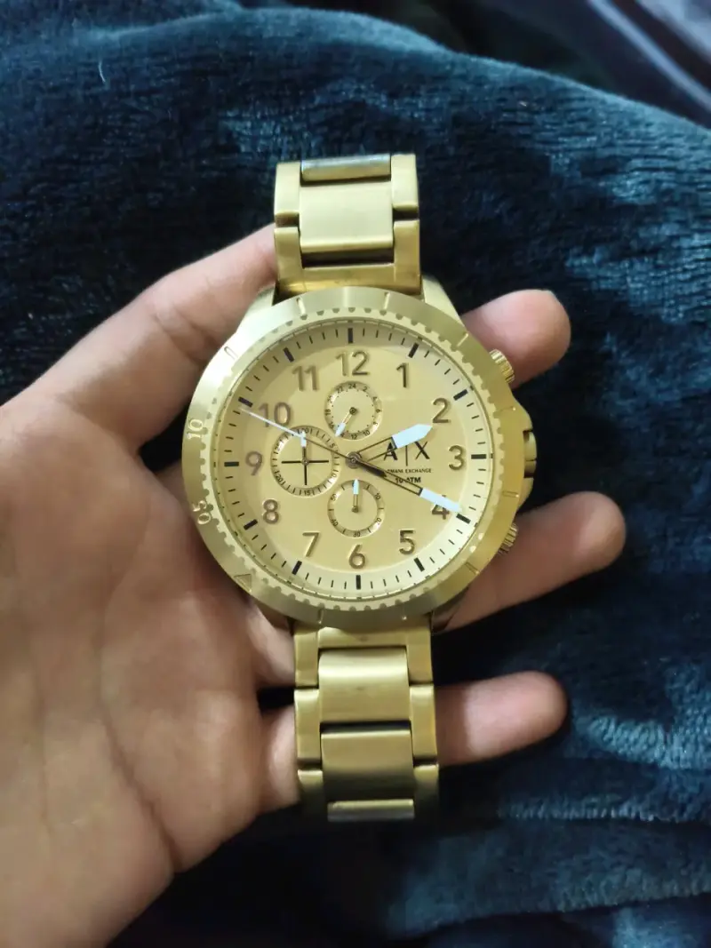 Reloj dorado clásico AIX
