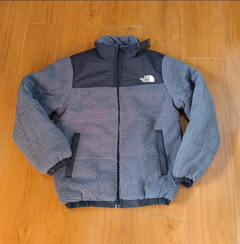 Chaqueta North Face acolchada gris