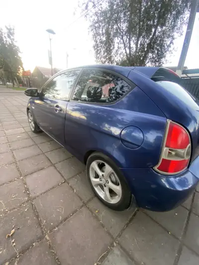 Auto azul con llantas negras full equipo y audio - miniatura 3