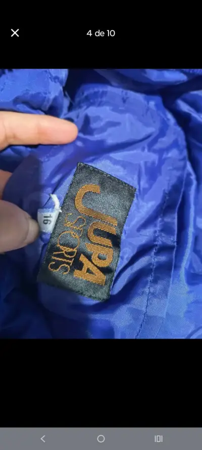 Chaqueta impermeable azul con capucha - miniatura 6