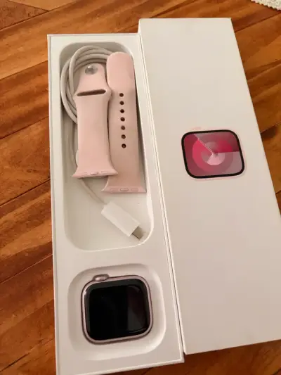 Reloj inteligente rosa en caja - miniatura 1