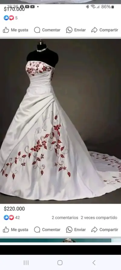 Vestido de novia con bordados rojos - miniatura 1
