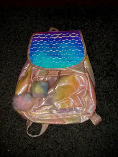 Mochila holográfica con pompón - miniatura 1