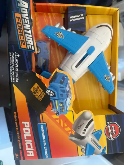 Avión con auto de policía - miniatura 1