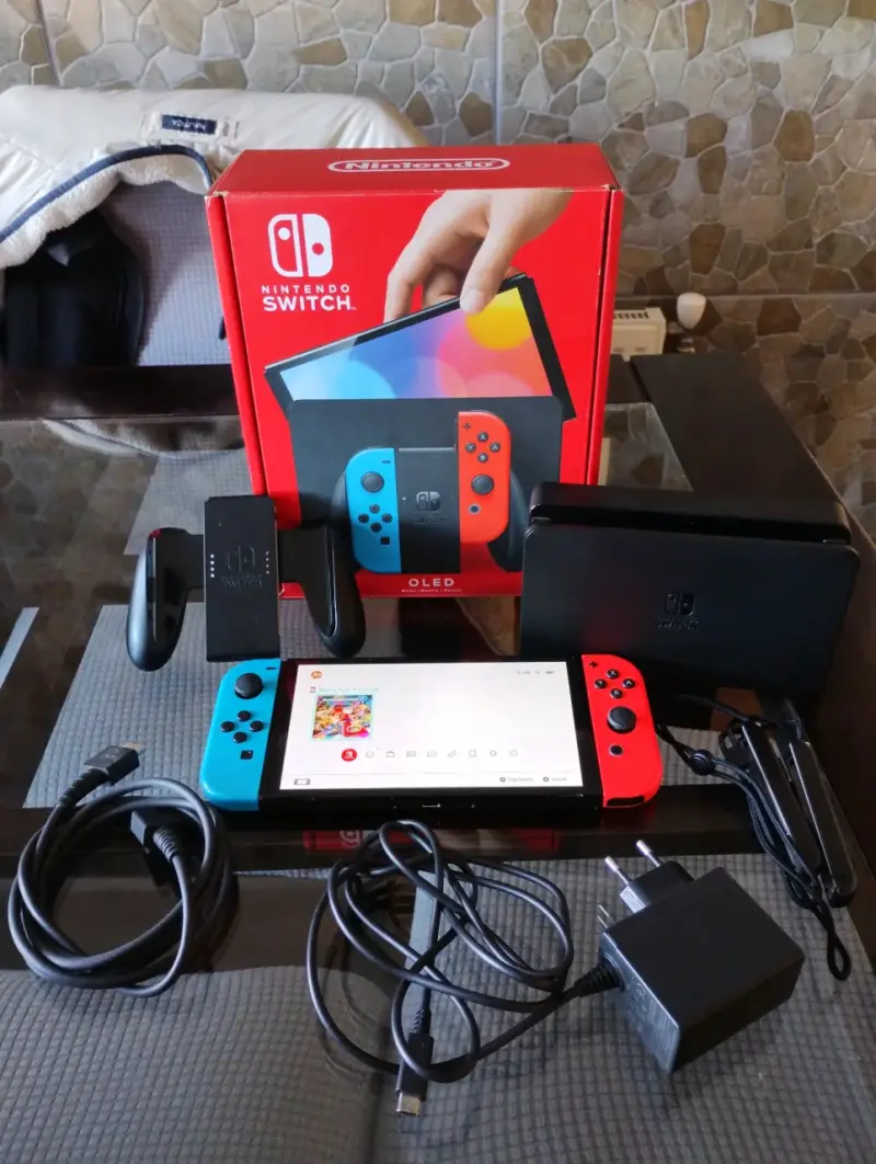 Nintendo Switch OLED+ juego Mario Kart y SD 64 gb - 1