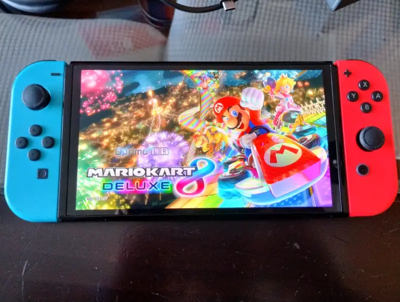 Nintendo Switch OLED+ juego Mario Kart y SD 64 gb - 5