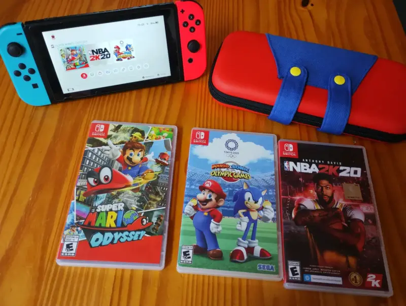 Nintendo Switch+3 juegos+SD 128 GB+ Bolso - 1