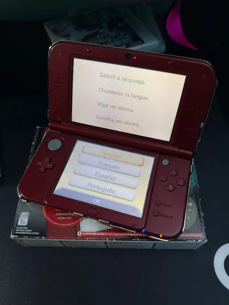 New Nintendo 3DS XL + 5 Juegos Pokémon + Cargador - 1