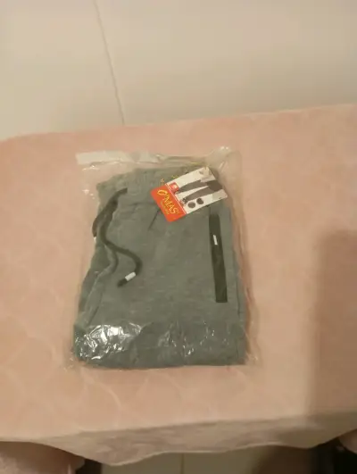 Pantalón gris nuevo en bolsa - miniatura 2