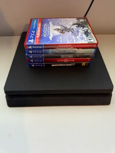 PlayStation 4 con 5 juegos y 2 controles - miniatura 2
