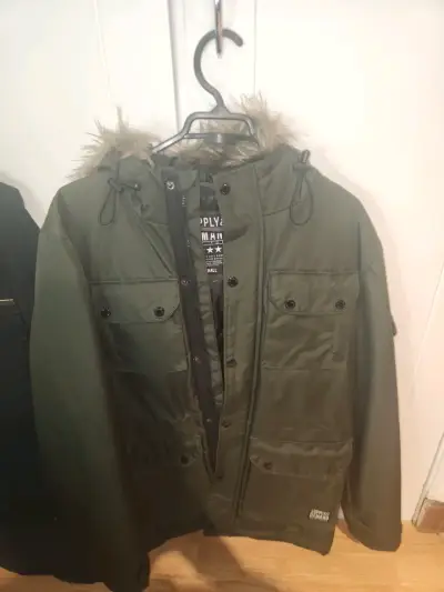 Parka verde con capucha - miniatura 1