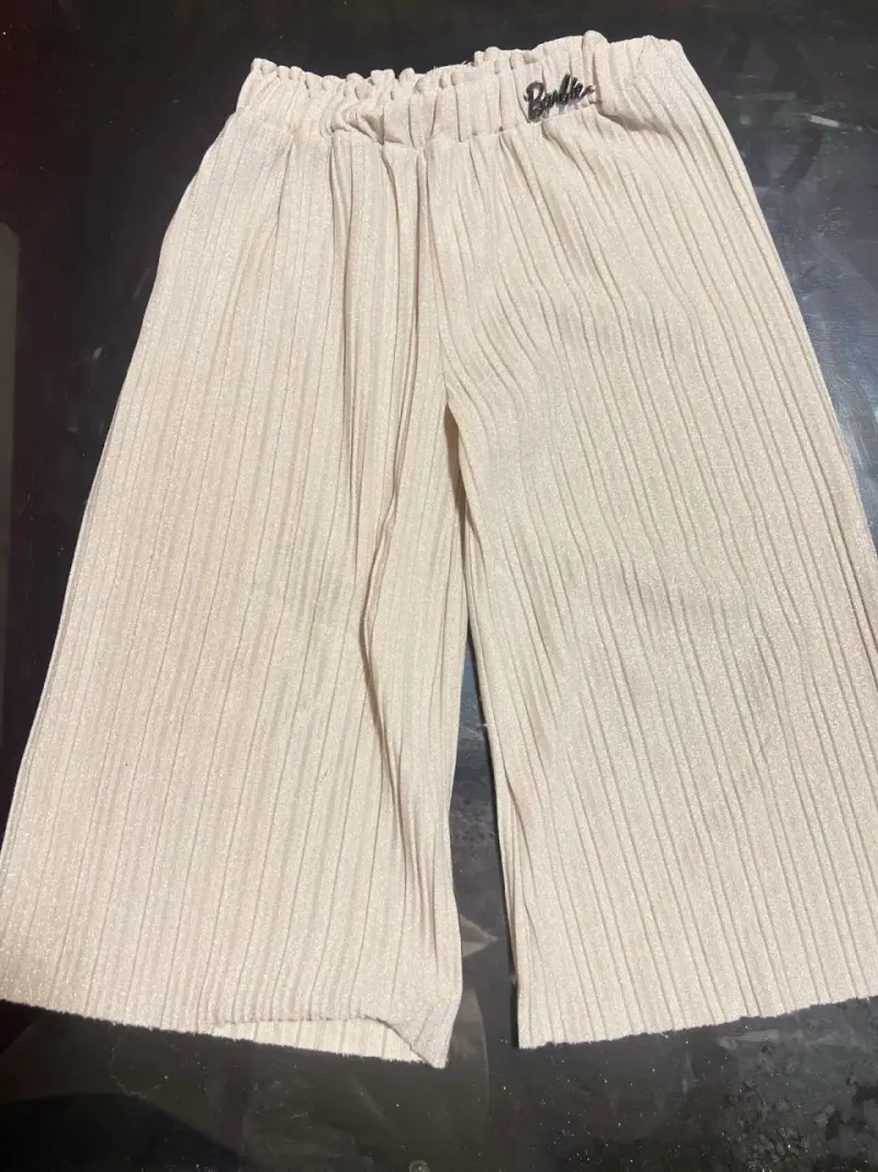 Pantalones plisados beige