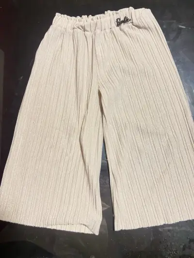 Pantalones plisados beige - miniatura 1