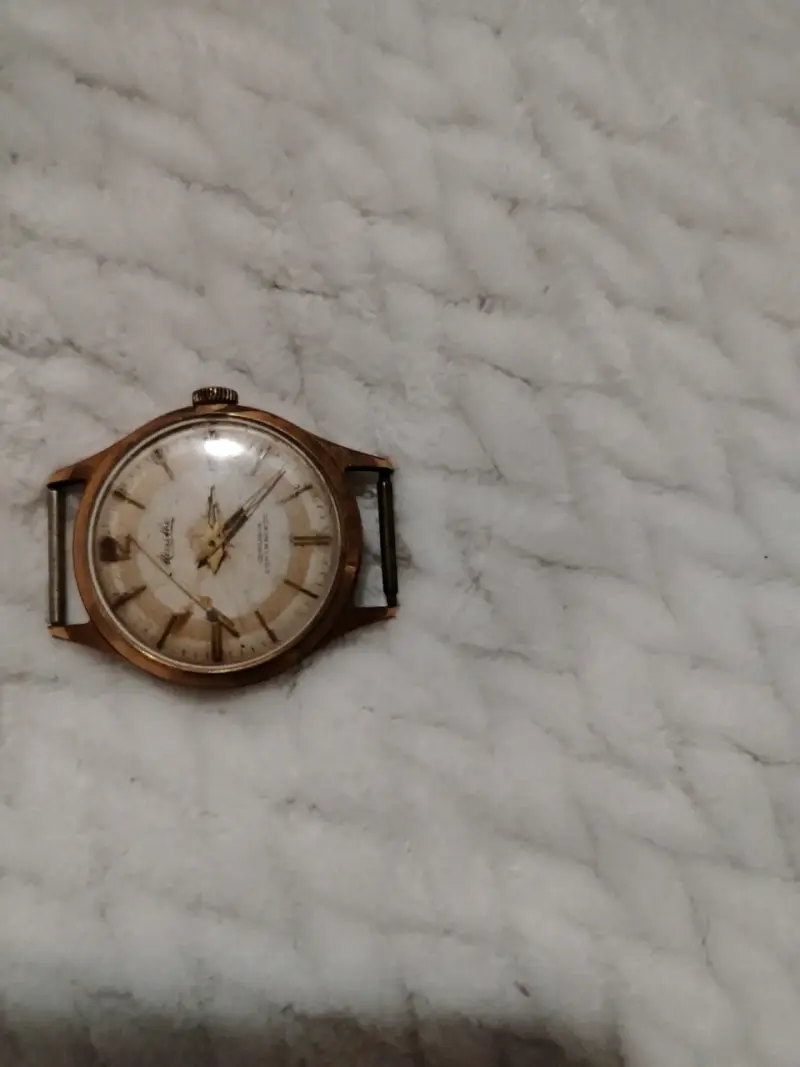 Reloj vintage de bronce