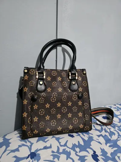 Cartera de mano con estampado - miniatura 1