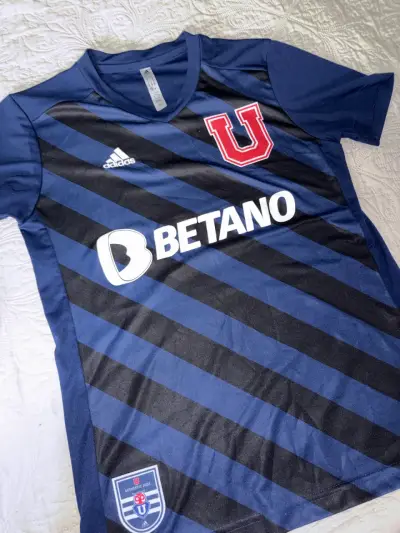 Camiseta deportiva azul con logo - miniatura 1